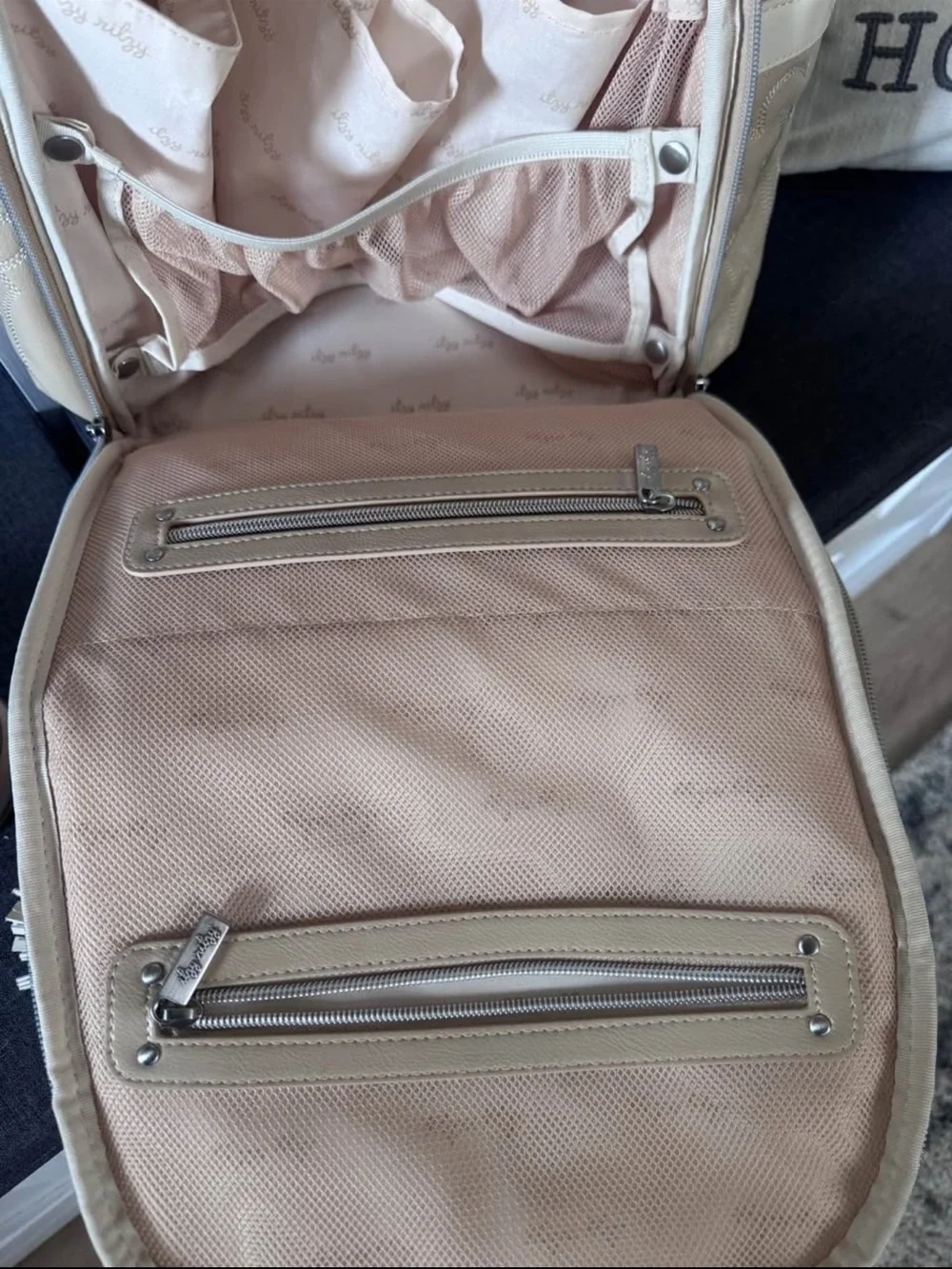 Itzy Ritzy Beige Cream Baby Bag Backpack with Tassel Charm